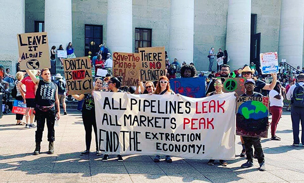 All pipelines leak. All markets peak. End the extraction economy!